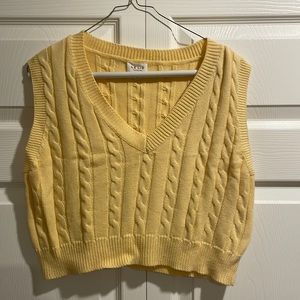 Size small pale yellow knit sweater vest.